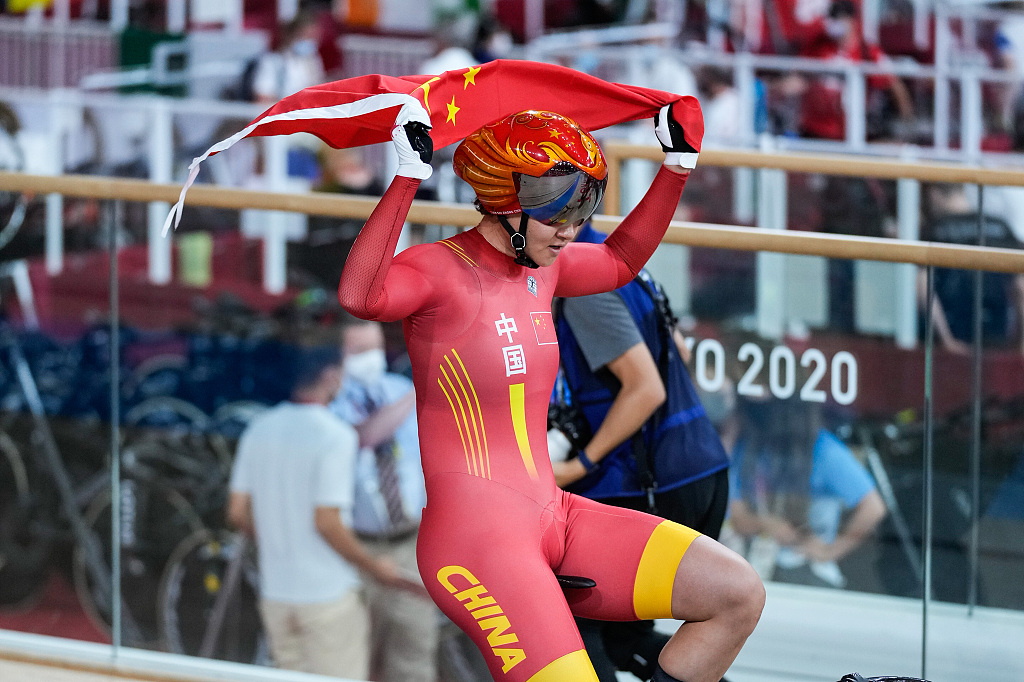 Zhong Tianshi of China celebrates after winning the cycling women's team sprint gold medal with her teammate Bao Shanju at the Summer Olympic Games in Tokyo, Japan, August 2, 2021. /CFP