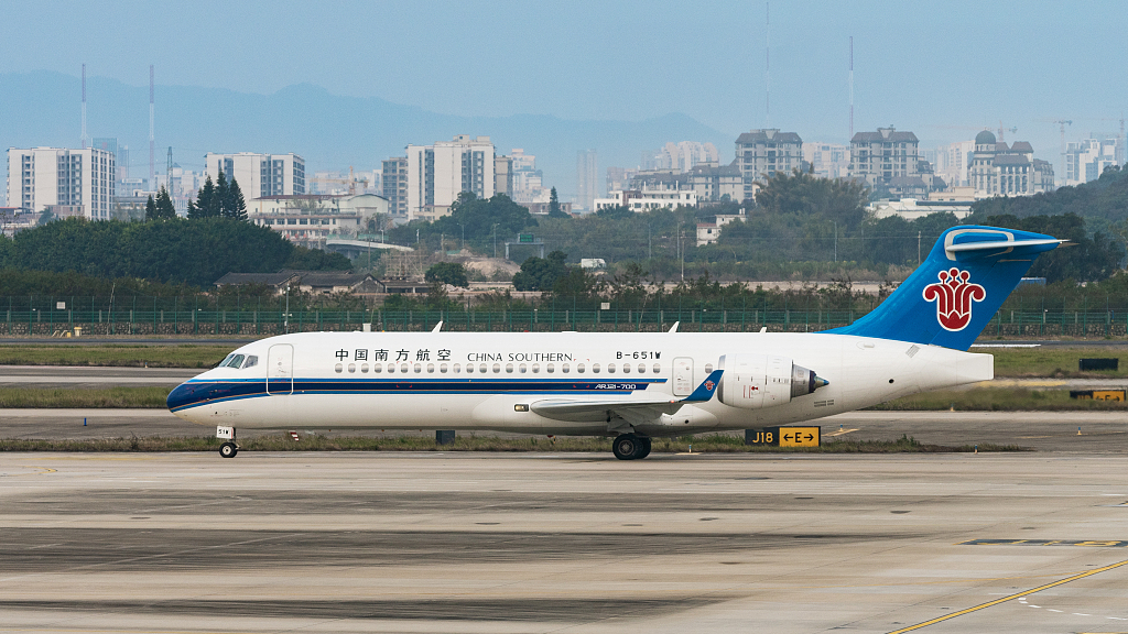 An ARJ21 jet parks at the Guangzhou Baiyun International Airport in Guangzhou City, south China's Guangdong Province, January 27, 2023. /CFP