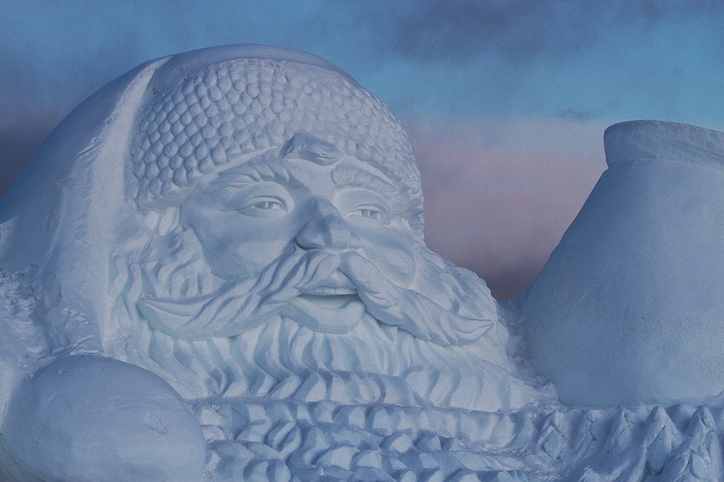 An ice and snow sculpture of Santa Claus in Mohe of northeast China's Heilongjiang Province. /CFP