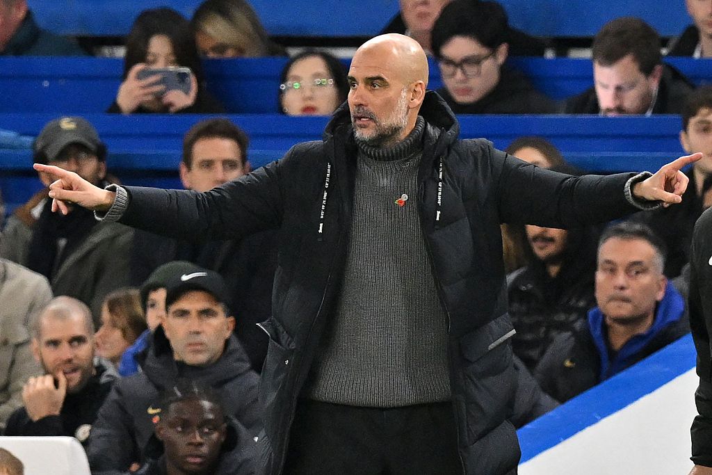 Pep Guardiola, manager of Manchester City, looks on during the Premier League game against Chelsea at Stamford Bridge in London, England, November 12, 2023. /CFP