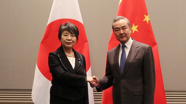 Chinese Foreign Minister Wang Yi (R), also a member of the Political Bureau of the CPC Central Committee, meets with Japanese Foreign Minister Yoko Kamikawa in Busan, ROK, November 25, 2023. /Chinese Foreign Ministry