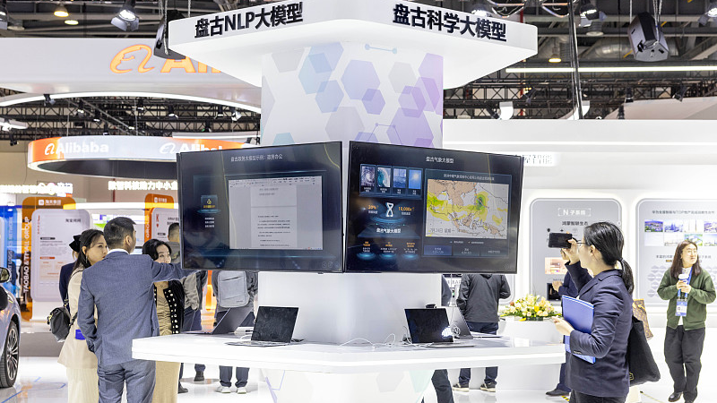 The Pangu natural language processing model developed by Huawei is displayed at the expo to show how the model can serve different industries, such as weather forecasting, November 24, 2023. /CFP
