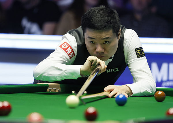 China's Ding Junhui plays a shot during his match against Northern Ireland's Mark Allen on day one of the Snooker UK Championship at York Barbican, in York, England, November 25, 2023. /CFP