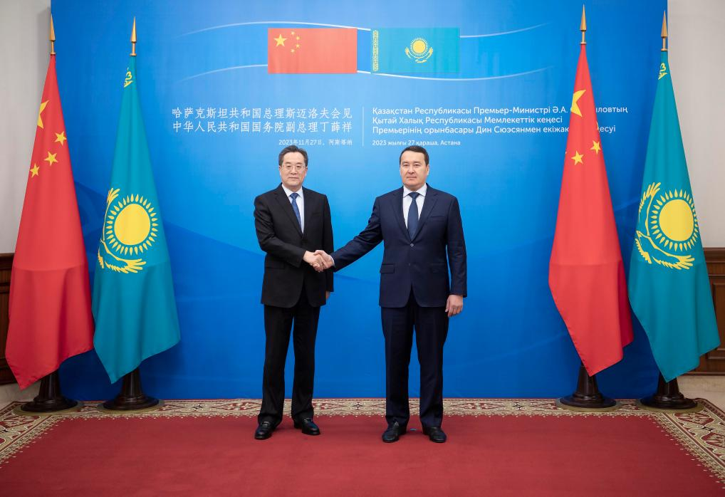 Chinese Vice Premier Ding Xuexiang (L), also a member of the Standing Committee of the Political Bureau of the CPC Central Committee, meets with Kazakh Prime Minister Alikhan Smailov in Astana, Kazakhstan, November 27, 2023. /Xinhua