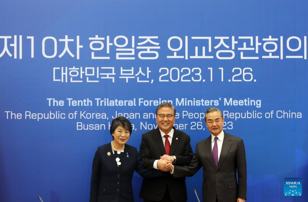 Chinese Foreign Minister Wang Yi, also a member of the Political Bureau of the Communist Party of China Central Committee, attends the tenth trilateral foreign ministers' meeting between China, Japan and South Korea with South Korean Foreign Minister Park Jin and Japanese Foreign Minister Yoko Kamikawa in Busan, South Korea, November 26, 2023. /Xinhua