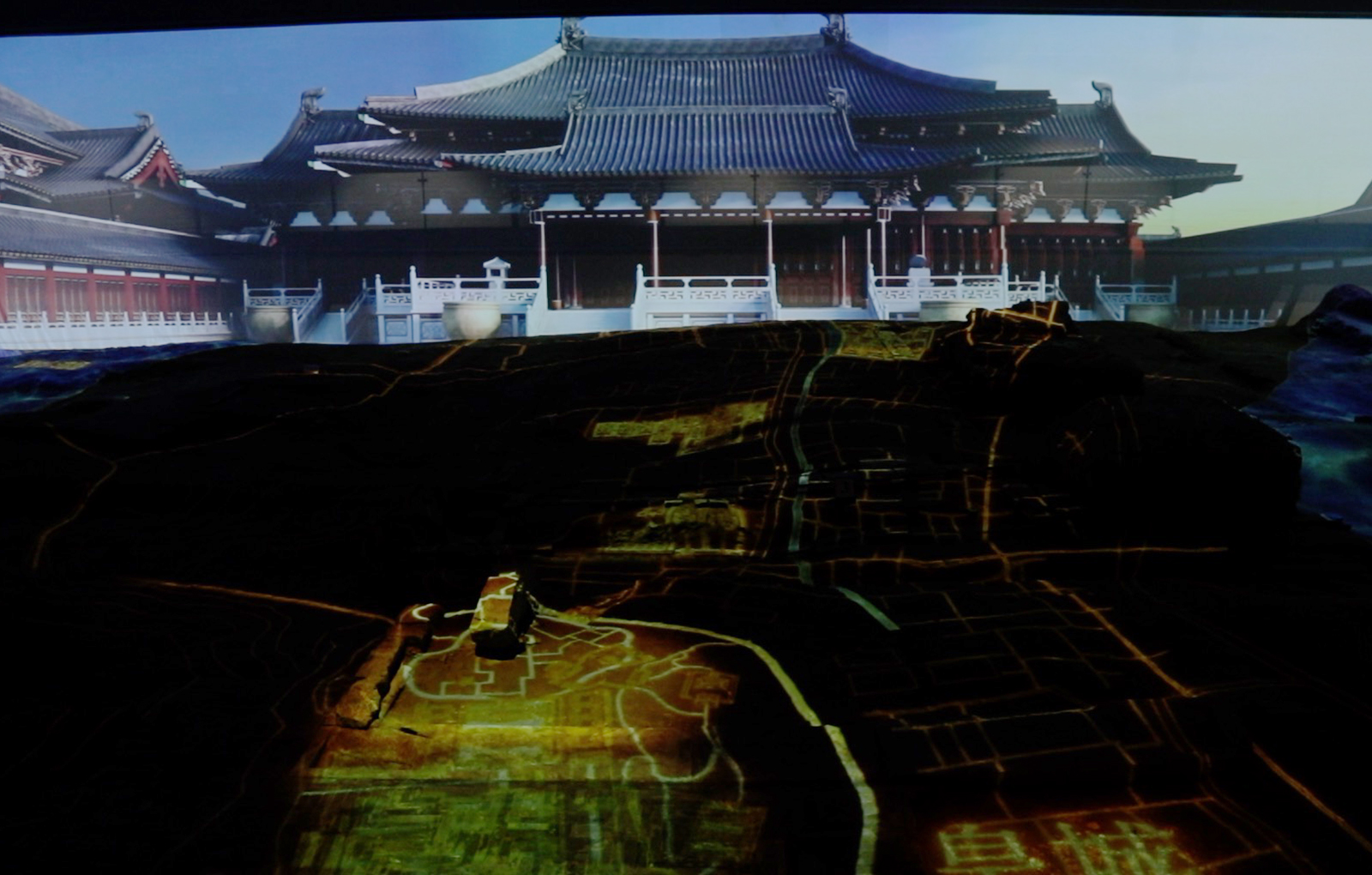 Digital installations replicate the original buildings of the Deshou Palace alongside the architectural remnants uncovered at the Deshou Palace Ruins Museum in Hangzhou, Zhejiang Province. /CGTN