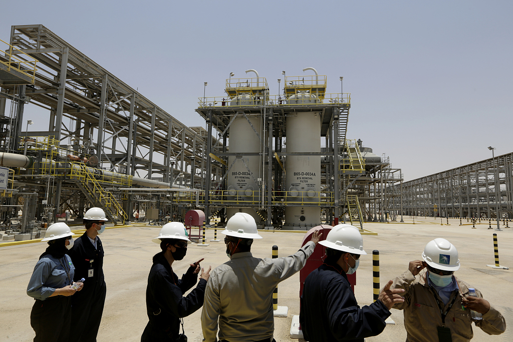 Engineers of Saudi Aramco, a Saudi energy giant, and journalists look at the Hawiyah Natural Gas Liquids Recovery Plant in Hawiyah province, Saudi Arabia, June 28, 2021. /CFP