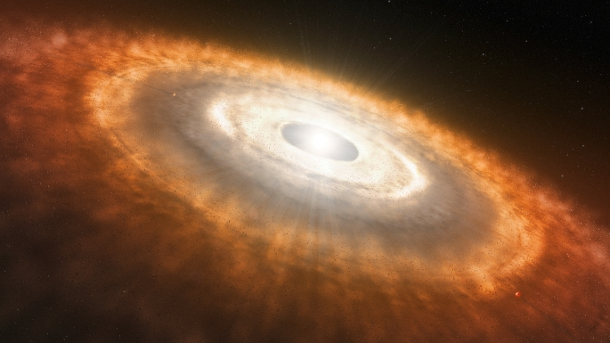 An artist's impression of a young star surrounded by a protoplanetary disk in which planets are forming. /NASA