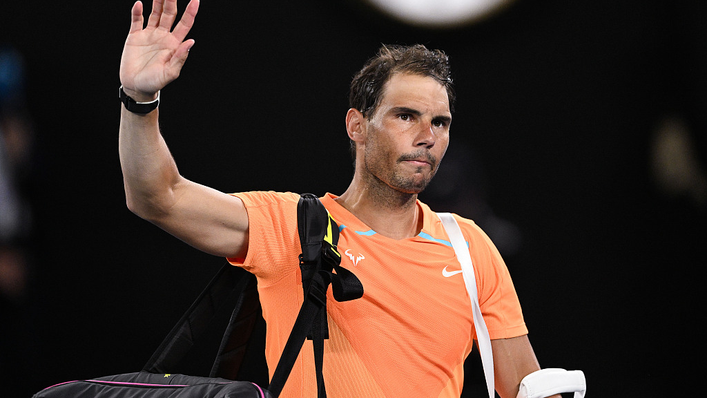 Rafael Nadal gestures to spectators after losing in the men's singles second round at the Australian Open in Melbourne, Australia, January 18, 2023. /CFP