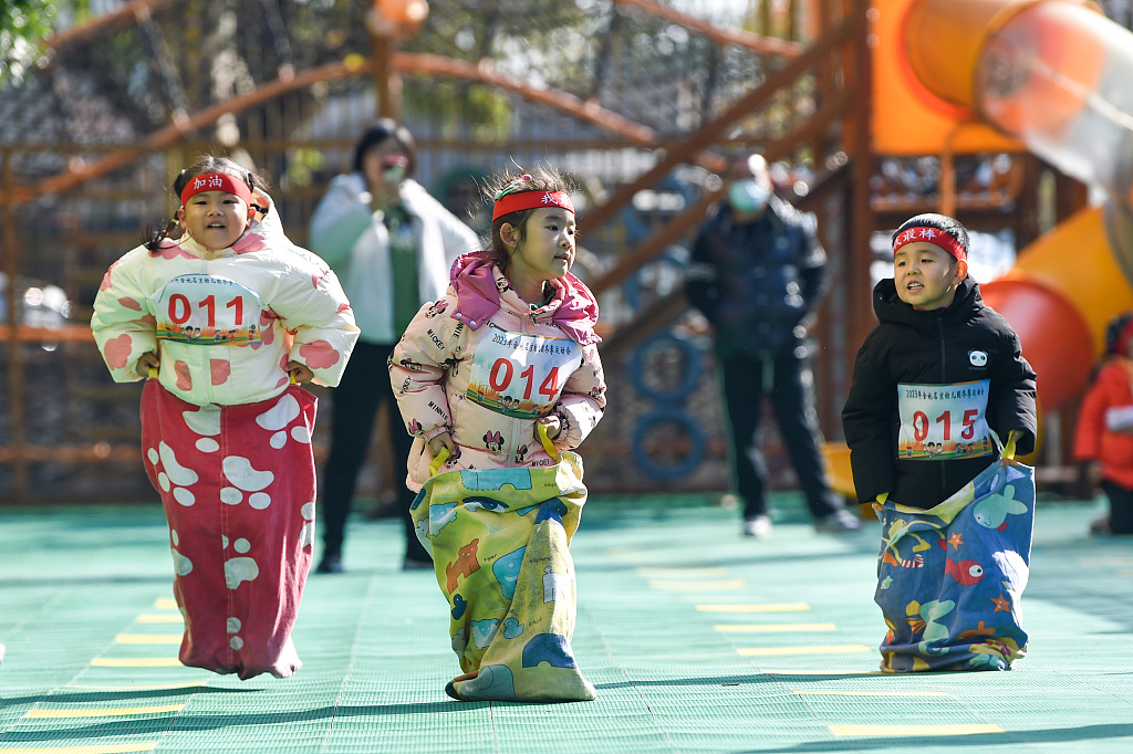 A photo taken on December 1, 2023, shows pupils participating in the games held by a kindergarten in Nanjing, Jiangsu Province. /CFP