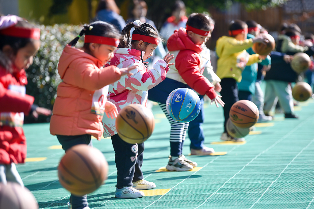 A photo taken on December 1, 2023, shows pupils participating in the games held by a kindergarten in Nanjing, Jiangsu Province. /CFP