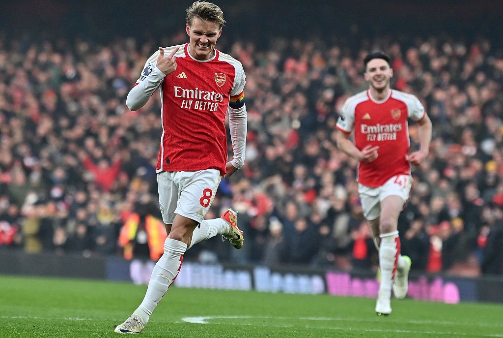 Martin Odegaard (L) of Arsenal celebrates after scoring his team's second goal during the Premier League match against Wolverhampton Wanderers at the Emirates Stadium in London, England, December 2, 2023. /CFP 