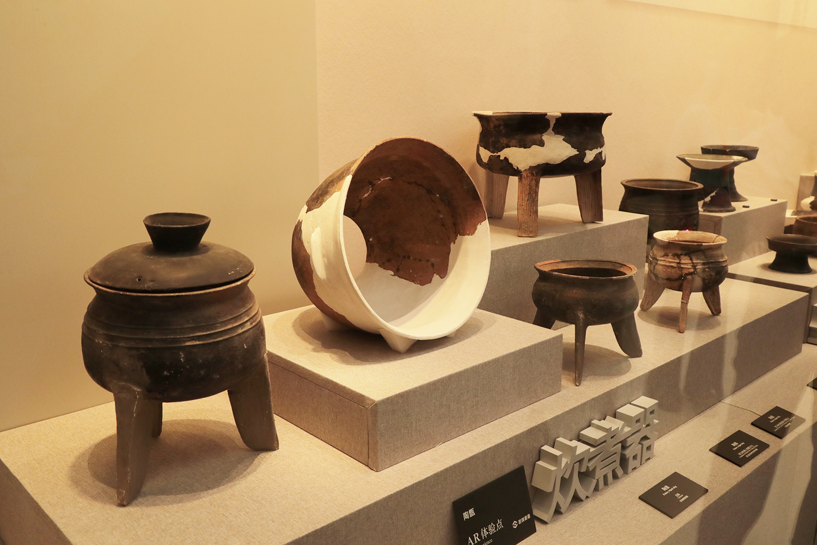 Pottery used for cooking during the time of Liangzhu Ancient City is on display at Liangzhu Museum in Hangzhou, Zhejiang Province. /CGTN