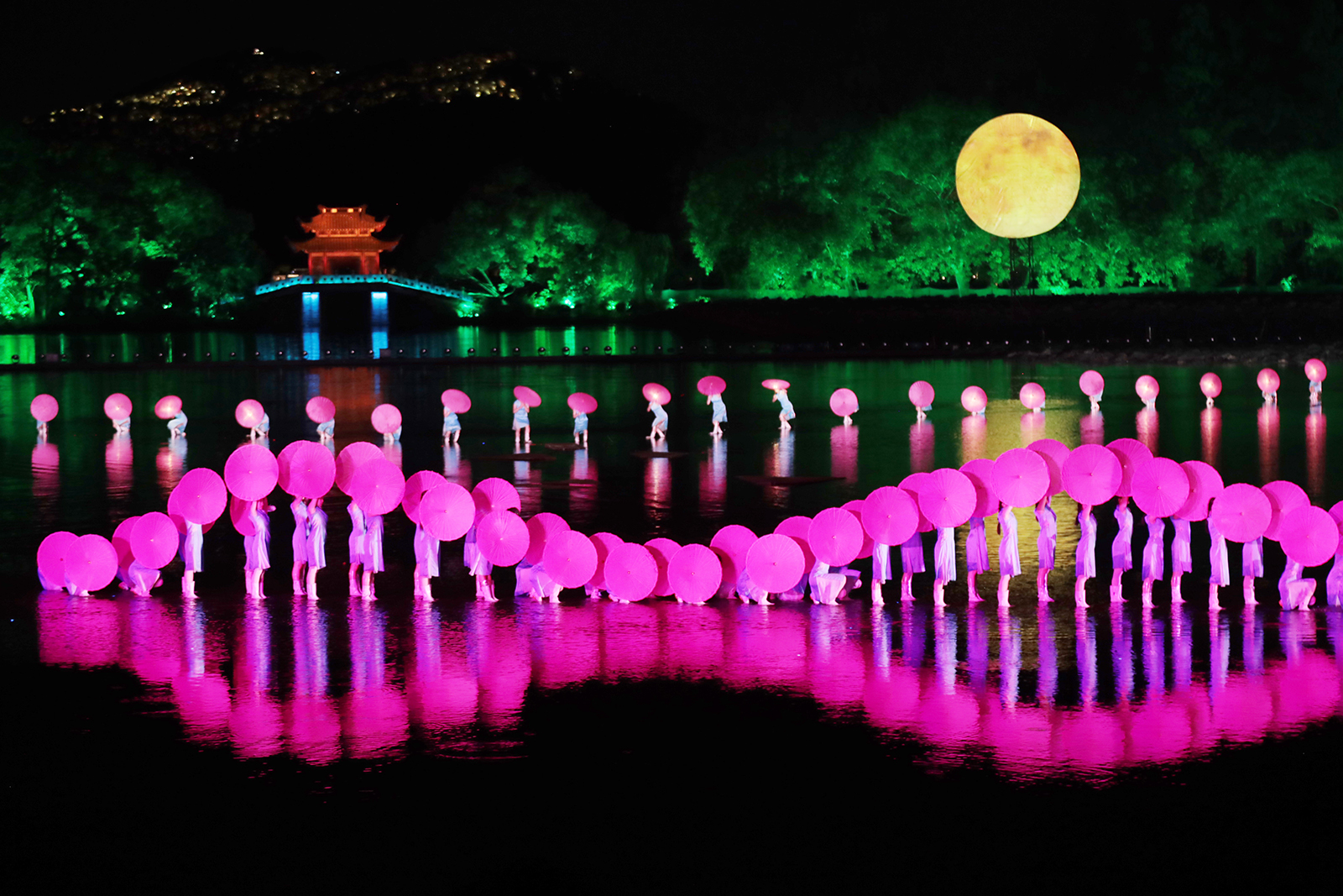 Dancers perform along with the classic Chinese tune 