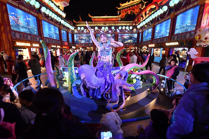 A series of folk activities are held at a torch festival in Qingdao City, Shandong Province, December 2, 2023. /CFP