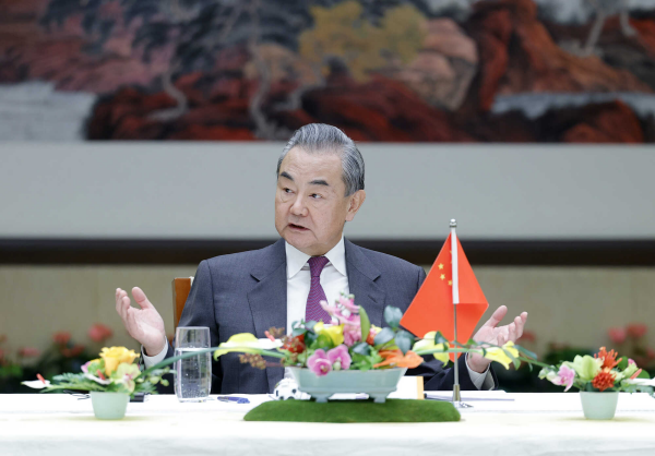 Member of the Political Bureau of the CPC Central Committee and Chinese Foreign Minister Wang Yi talks with envoys and diplomats of the EU and its member states in Beijing, China, December 4, 2023. /Chinese Foreign Ministry