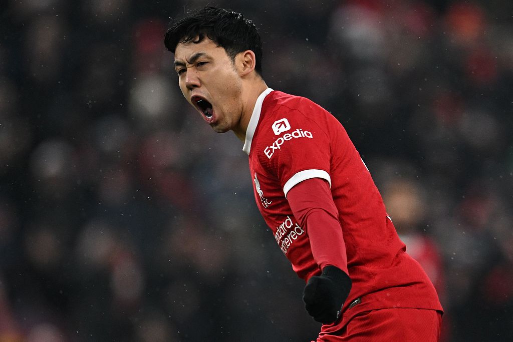 Liverpool's Wataru Endo celebrates after scoring his team's third goal during their clash with Fulham at Anfield in Liverpool, England, December 3, 2023. /CFP