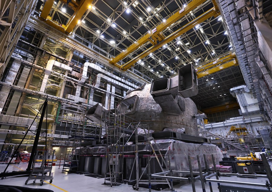 A vast device is seen at a pre-assembly hall of the world's largest fusion experiment machine, the ITER Tokamak, in St Paul-Lez-Durance, France, November 23, 2023. /Xinhua