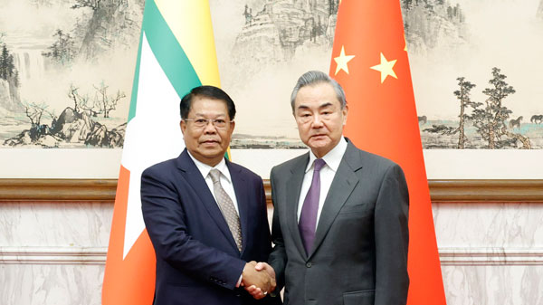 Chinese Foreign Minister Wang Yi (R), also a member of the Political Bureau of the Communist Party of China Central Committee, shakes hands with U Than Swe, who is Myanmar's deputy prime minister and foreign minister, in Beijing, China, December 6, 2023. /Chinese Foreign Ministry 