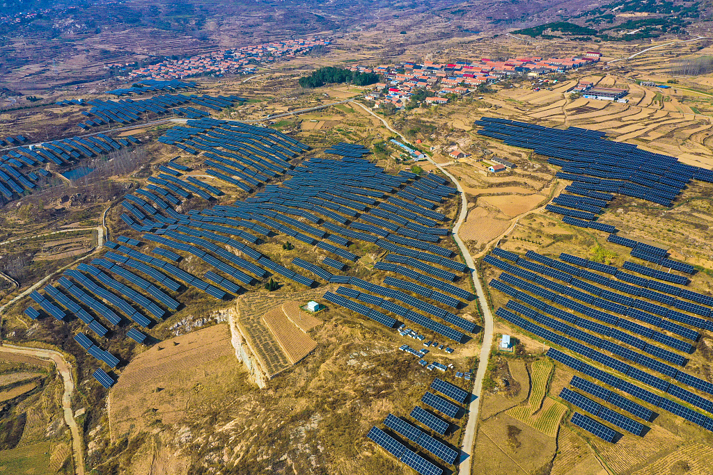 Solar panels are installed on hills in Rizhao, east China's Shandong Province. /CFP