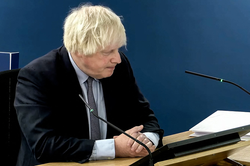 Britain's former Prime Minister Boris Johnson speaks at the UK COVID-19 Inquiry, in west London, December 6, 2023. /CFP
