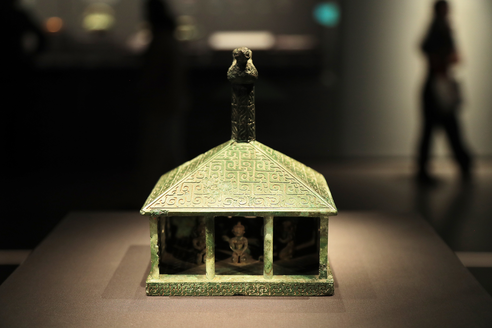A bronze house model with figurines of dancers and musicians dating to the Spring and Autumn period (770-476BC) is on display in the Zhijiang Branch of the Zhejiang Provincial Museum in Hangzhou, Zhejiang Province. /CGTN