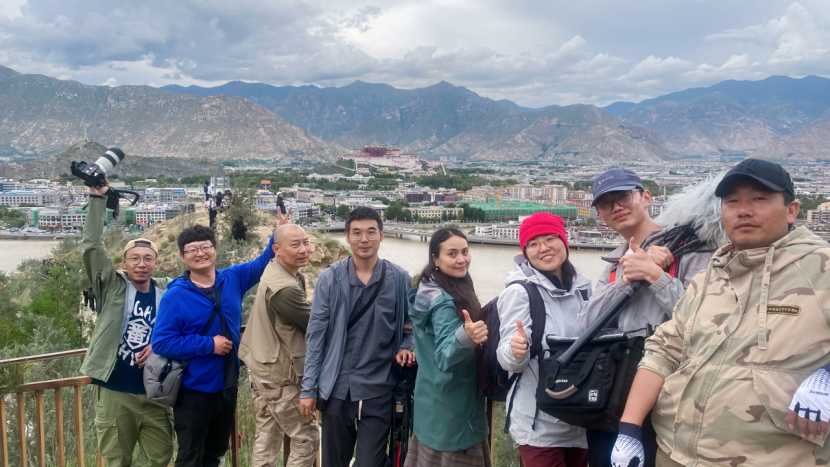 A group photo of the director team and camera crew of the documentary, Lhasa, southwest China's Xizang Autonomous Region, August 2, 2023. /CGTN