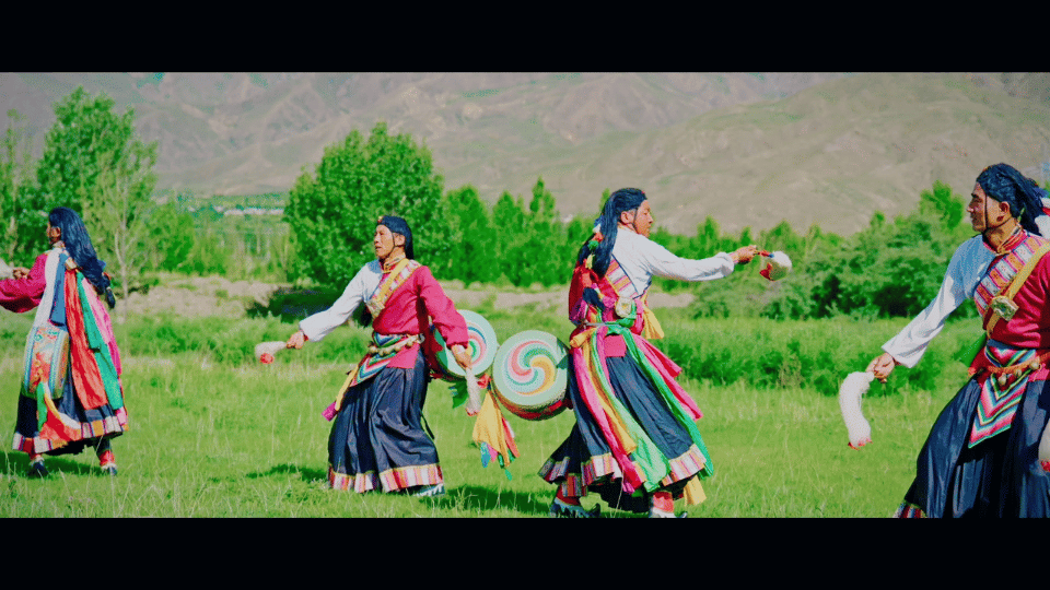 A GIF image from the documentary, showing people performing the Jiuhe Dro Dance. /CGTN