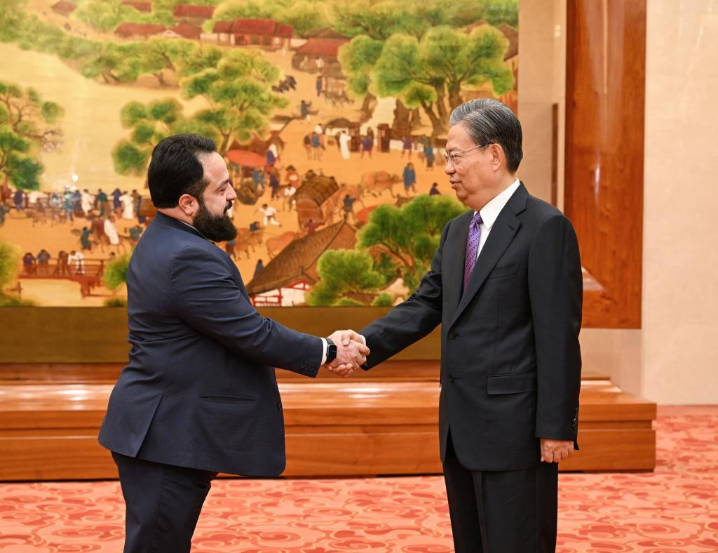 Zhao Leji (R), chairman of the National People's Congress (NPC) Standing Committee, holds talks with Luis Redondo, president of the National Congress of Honduras, at the Great Hall of the People in Beijing, capital of China, December 7, 2023. /Xinhua
