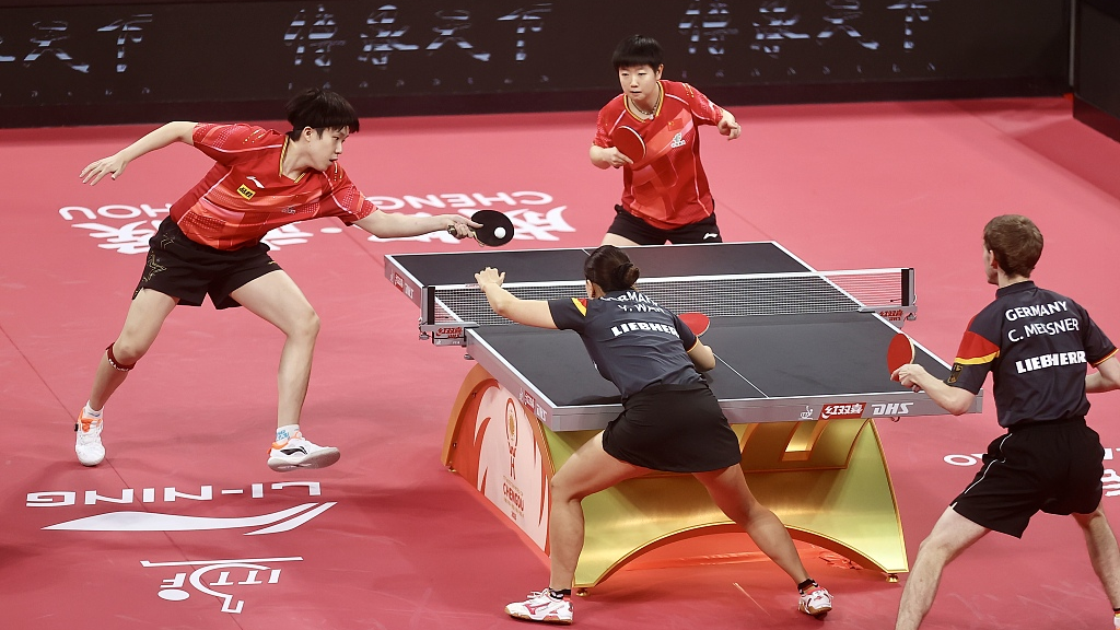 Chinese and German players in action during the ITTF Mixed Team World Cup second stage in Chengdu, southwest China's Sichuan Province, December 8, 2023. /CFP