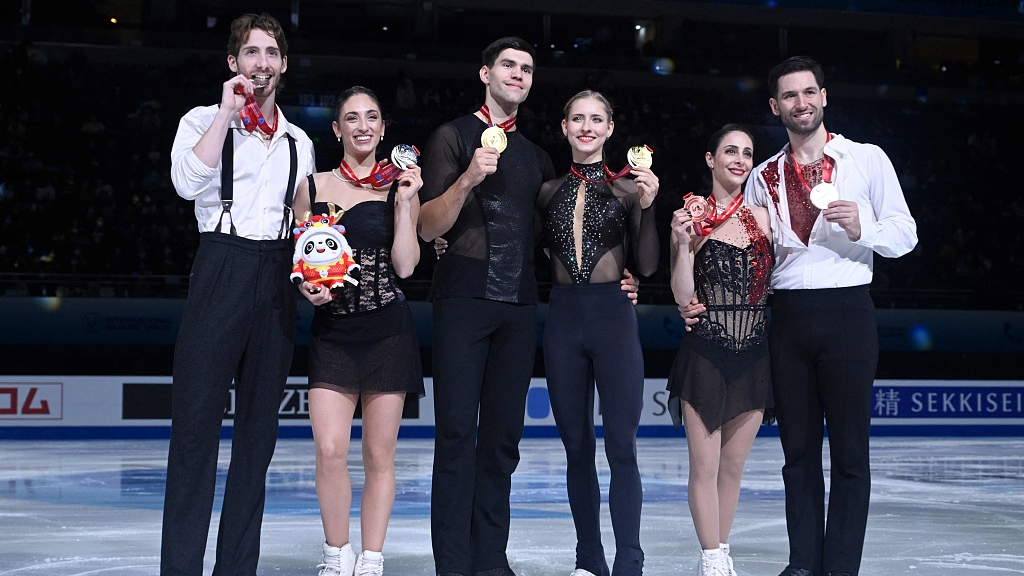 Skaters of Italy, Germany, and Canada celebrate after the pairs free skating during the ISU Grand Prix of Figure Skating Final in Beijing, China, December 8, 2023. /CFP