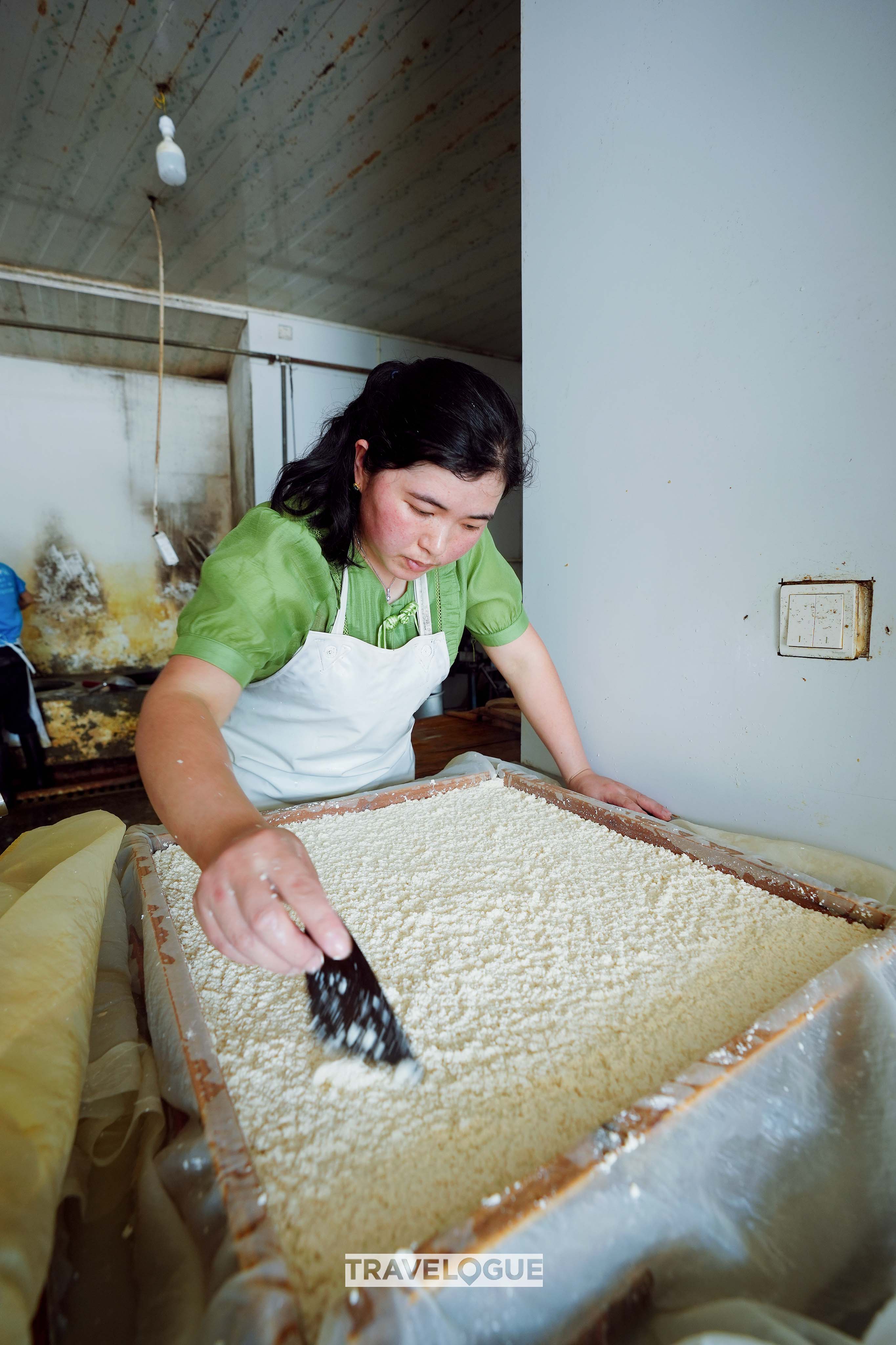 An undated photo shows the production of hairy tofu in east China's Anhui Province. /CGTN