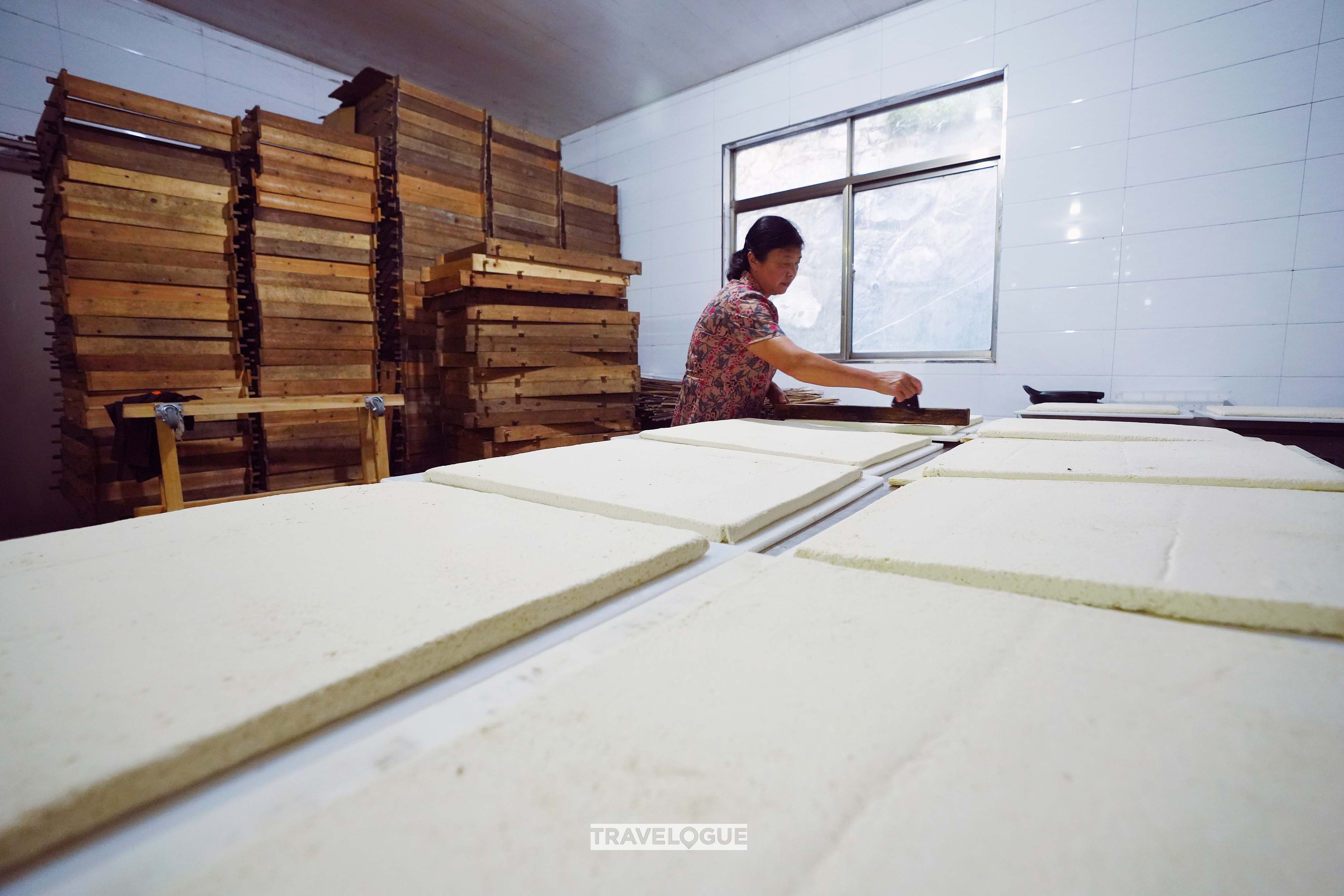 An undated photo shows the production of hairy tofu in east China's Anhui Province. /CGTN