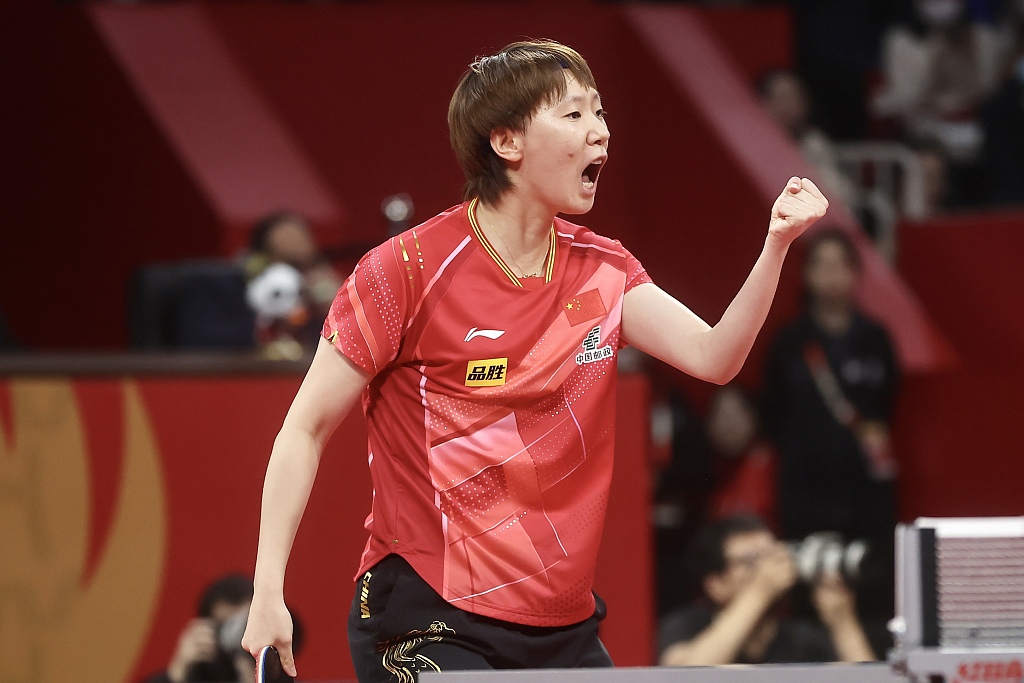 China's Wang Manyu reacts during the semifinal of the International Table Tennis Federation Mixed Team World Cup in Chengdu, China, December 9, 2023. /CFP