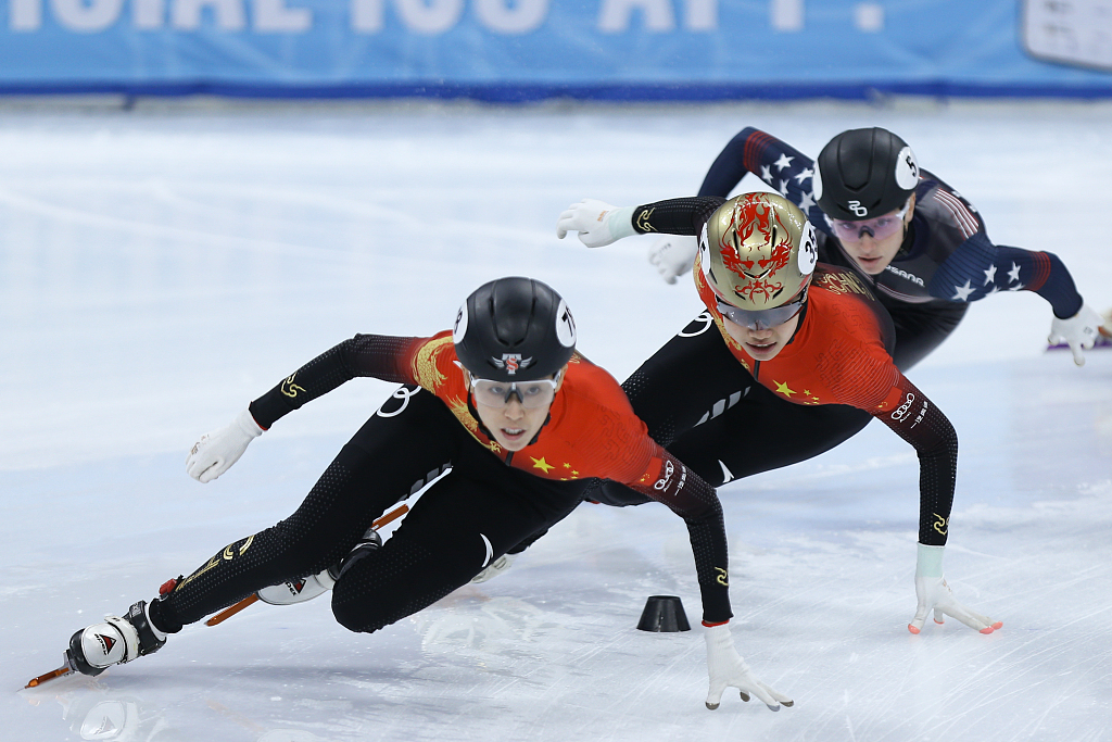 China's Fan Kexin (L) and Wang Ye (C) compete in the women's 500m final during the ISU Short Track Speed Skating World Cup in Beijing, China, December 9, 2023. /CFP