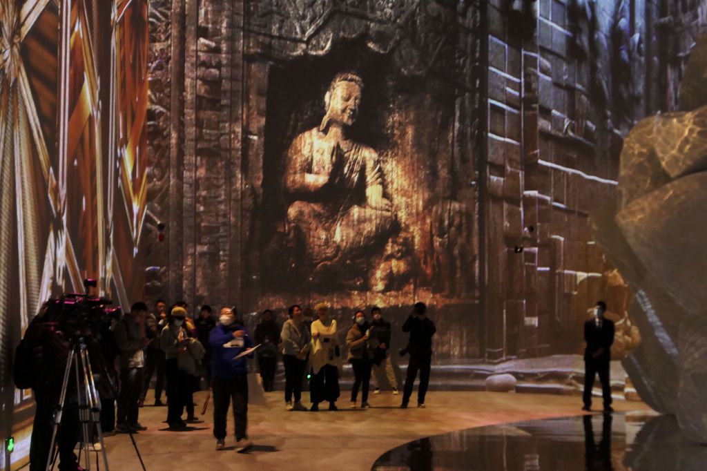 An immersive exhibition featuring Chinese grotto art opens to the public at the National Museum of China in Beijing on December 9, 2023. /CFP