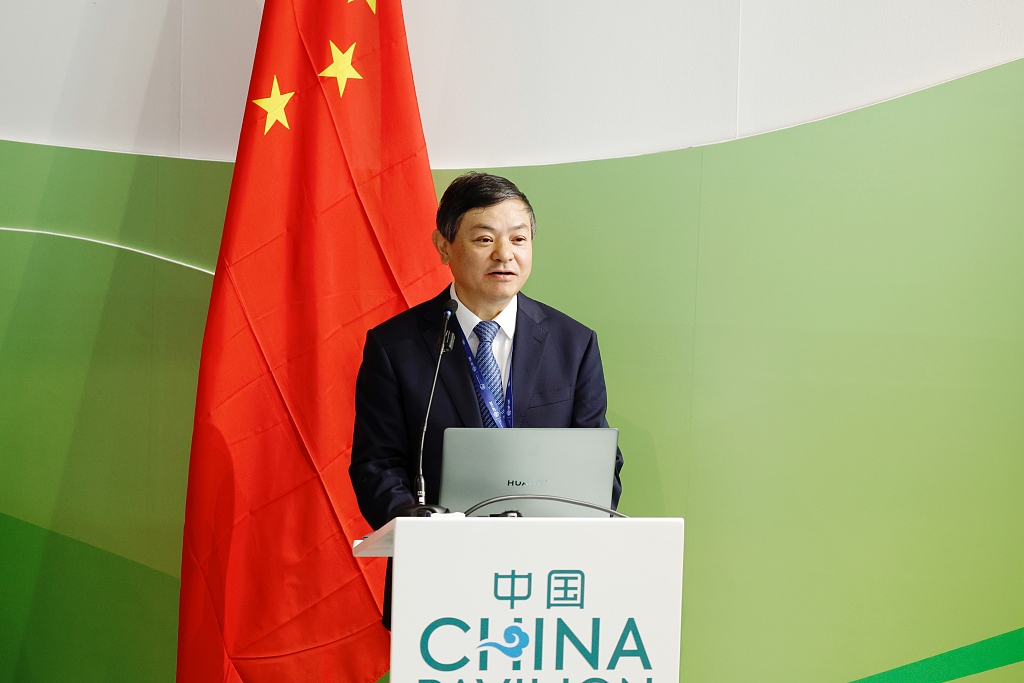 Huang Runqiu, COP15 president and China's minister of ecology and environment, speaks at a China pavilion side event on November 30. /CFP