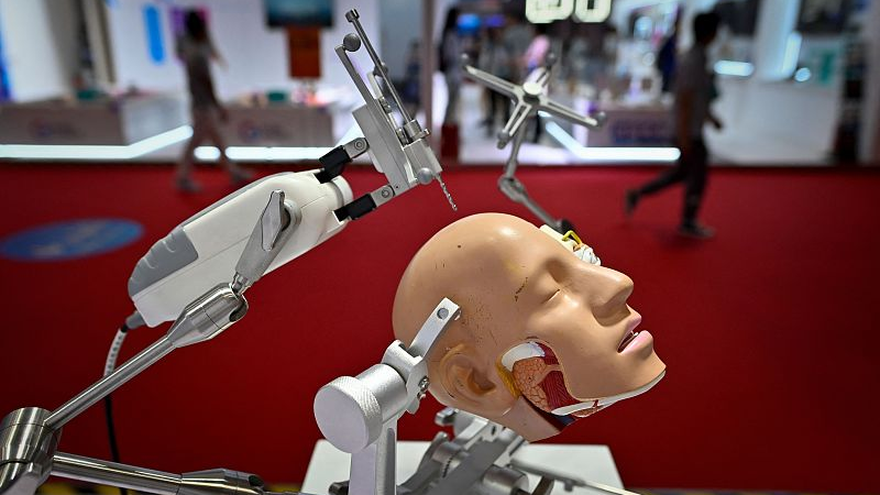 A robotic surgery arm is pictured at the 2023 World Robot Conference in Beijing, August 16, 2023. /CFP