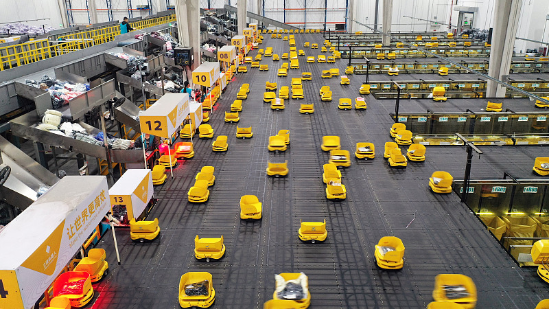 Robots sort and deliver packages in a logistics park in Huzhou, Zhejiang Province, November 8, 2023. /CFP