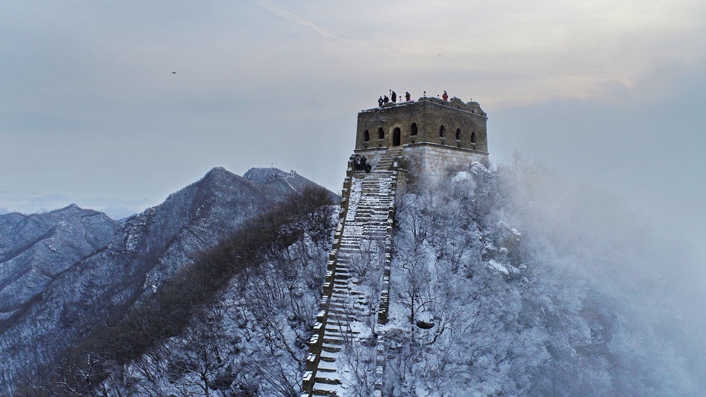 A photo shows visitors on the Jiankou section of the Great Wall in Beijing on December 11, 2023. /IC
