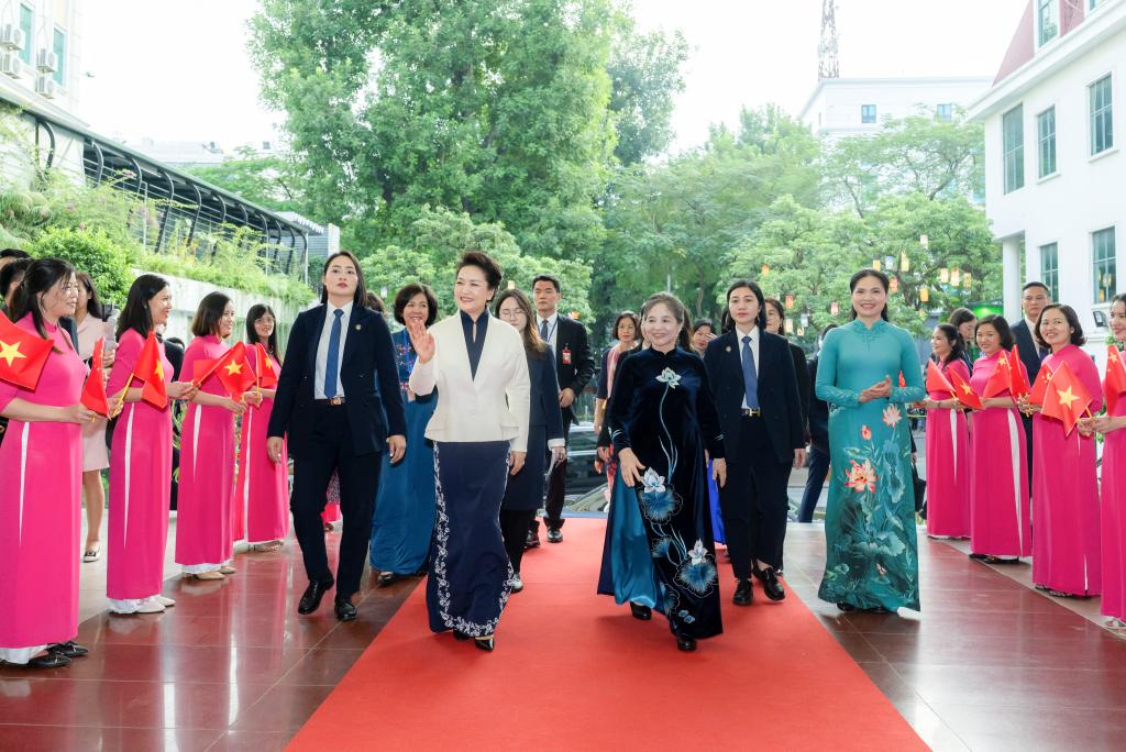 Peng Liyuan, spouse of General Secretary of the Communist Party of China Central Committee and Chinese President Xi Jinping, visits the Vietnamese Women's Museum and has tea with Ngo Thi Man, spouse of General Secretary of the Communist Party of Vietnam Central Committee Nguyen Phu Trong, in Hanoi, capital of Vietnam, December 12, 2023. /Xinhua