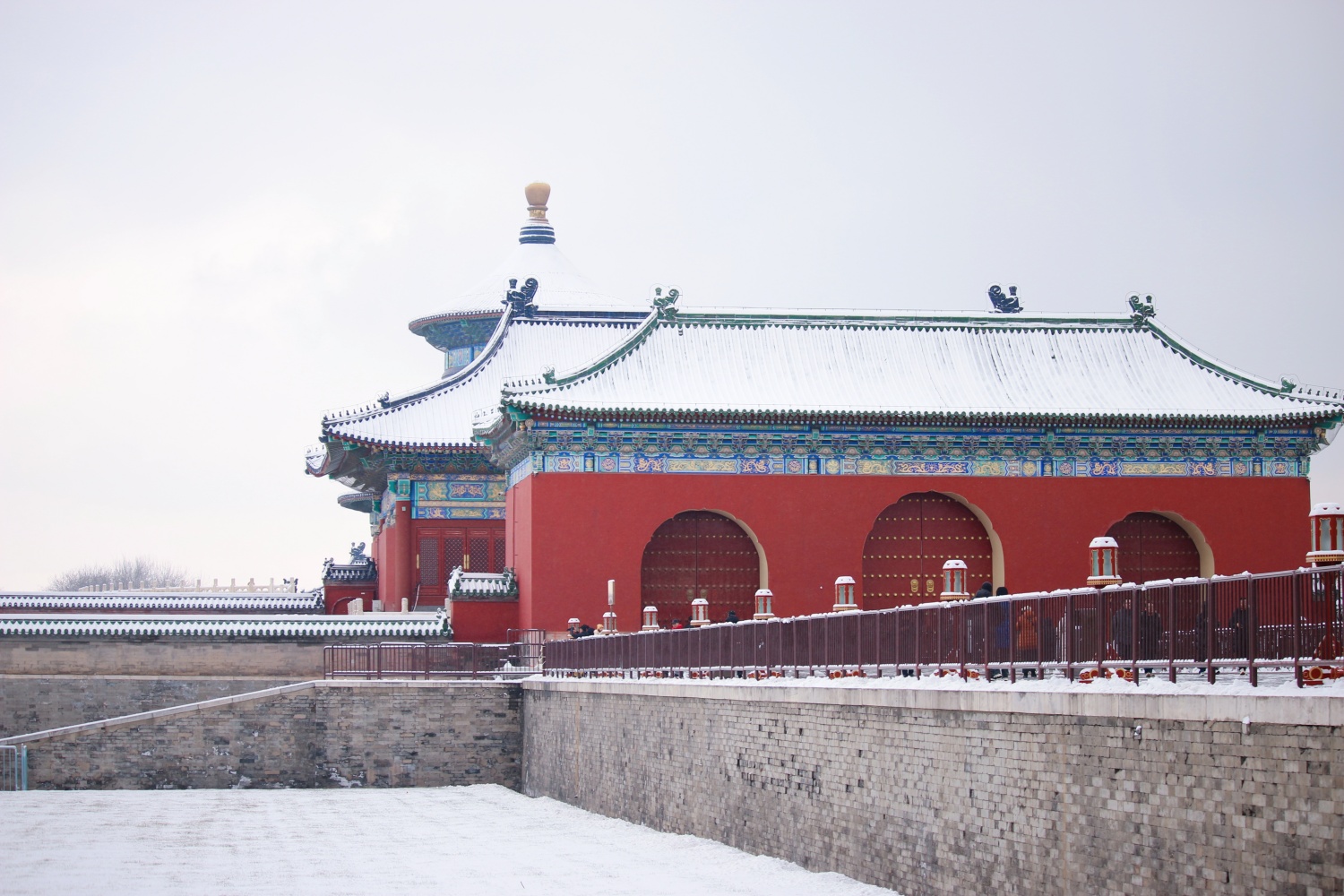 Snow-enveloped imperial religious buildings in the Temple of Heaven in Beijing are seen in this photo taken on Dec. 11, 2023. /CGTN