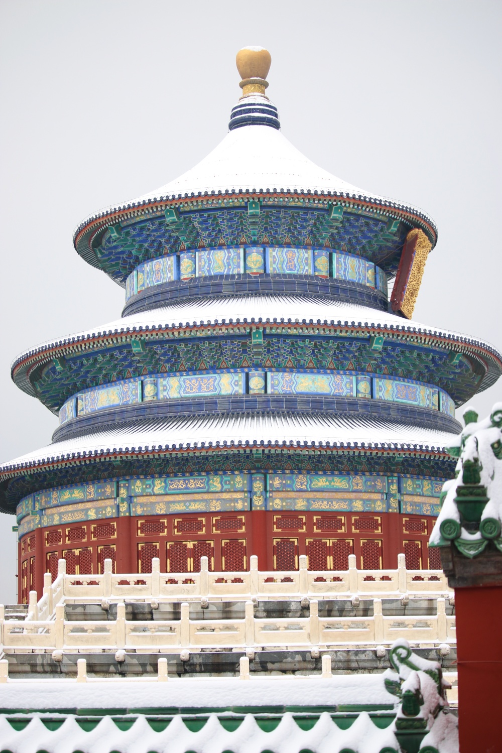 The snow-capped Hall of Prayer for Good Harvests, the largest building in the Temple of Heaven in Beijing, is seen in this photo taken on Dec. 11, 2023. /CGTN