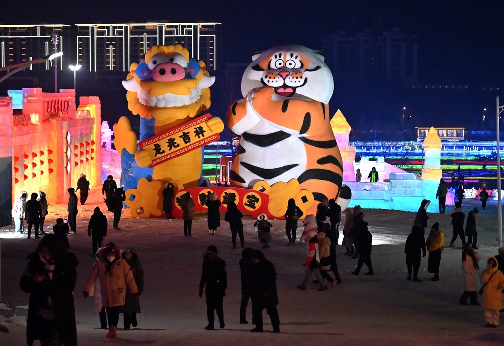Dragon and tiger characters are seen at Changchun Ice and Snow New World in Jilin, Changchun on December 12, 2023. /IC