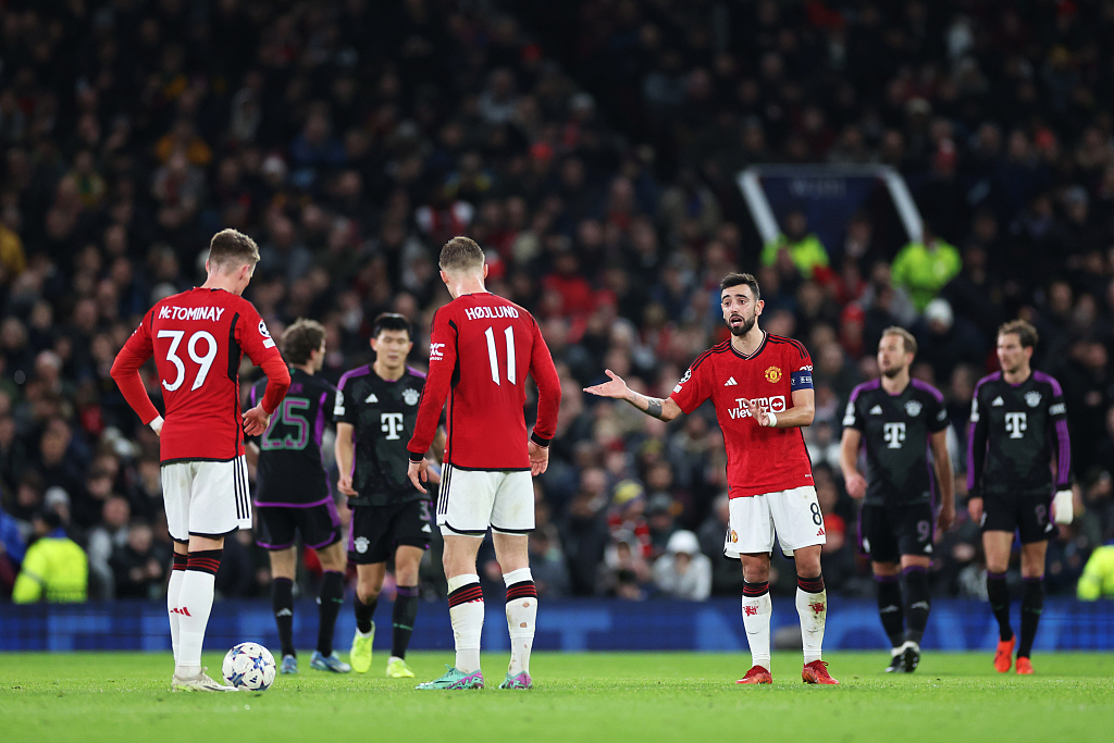 Manchester United reacts after Kingsley Coman of Bayern Munich scores  during their Champions League clash at Old Trafford in Manchester, England, December 12, 2023. /CFP