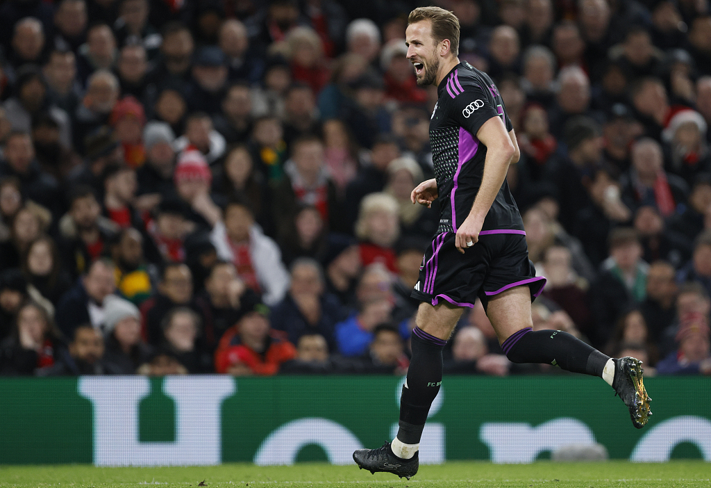 Harry Kane celebrates Bayern Munich's goal during their clash with Manchester at Old Trafford in Manchester, England, December 12, 2023. /CFP