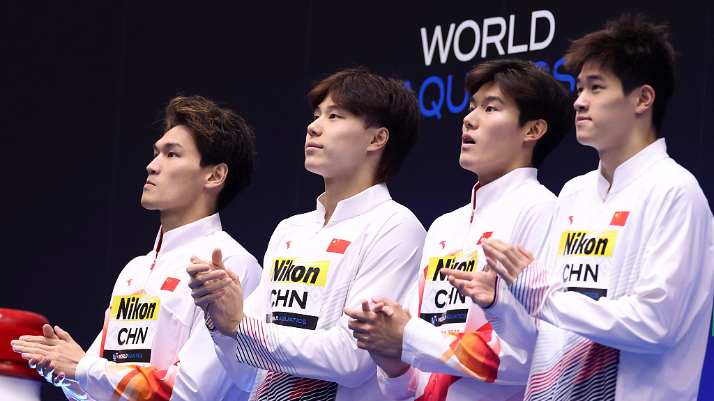 L-R: Xu Jiayu, Qin Haiyang, Wang Changhao and Zhanle Pan pose during the medal ceremony for men's 4x100m medley relay at World Aquatics Championships in Fukuoka, Japan, July 30, 2023. /CFP