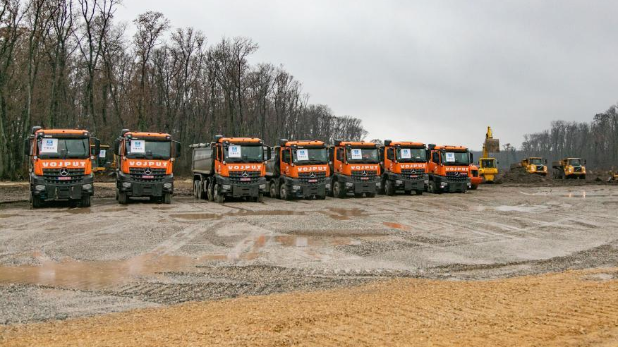 Trucks at the construction site of Serbia's Backi Breg-Srpska Crnja expressway in Backi Breg, Serbia, December 13, 2023. /Xinhua