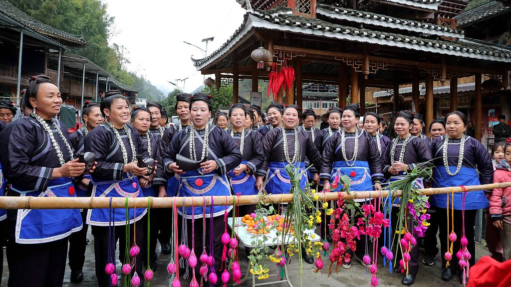 Photo taken on December 12, 2023 shows Dong women celebrating Dong New Year in Jiuwai Dong Village, Rongjiang County, Guizhou Province. /CFP