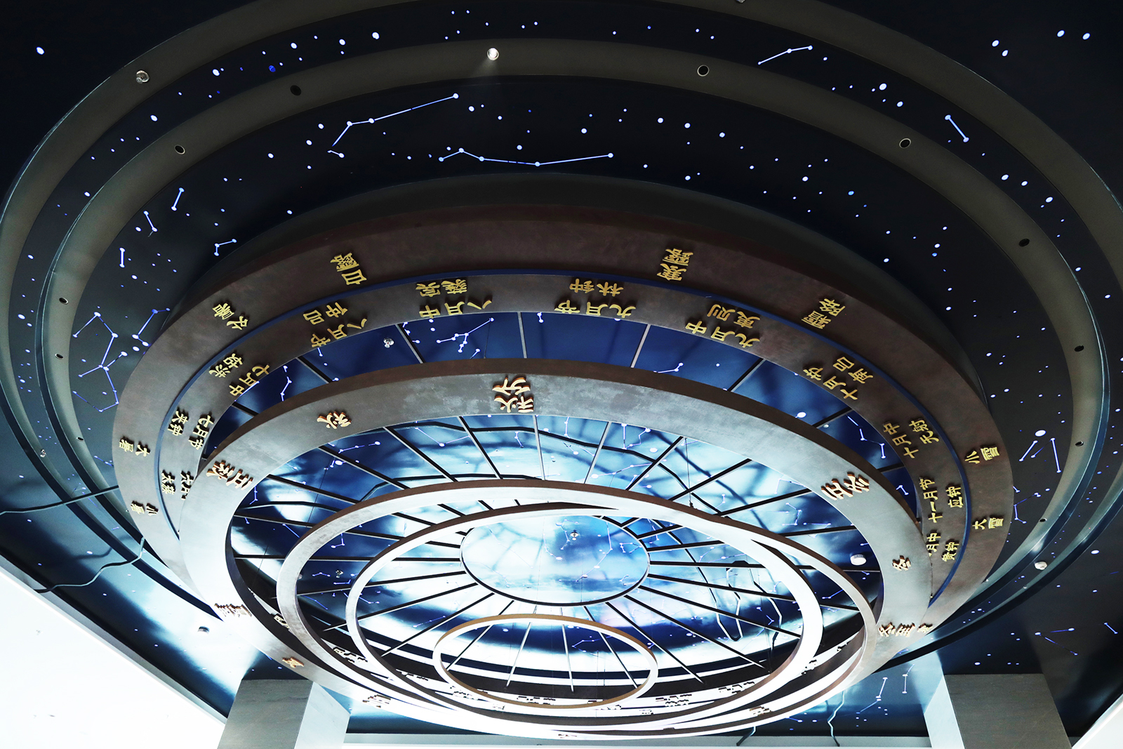 A statue featuring the 24 Chinese solar terms made using bronze sculpture techniques is suspended in the entrance hall of Zhejiang Intangible Cultural Heritage Museum in Hangzhou, Zhejiang Province. /CGTN